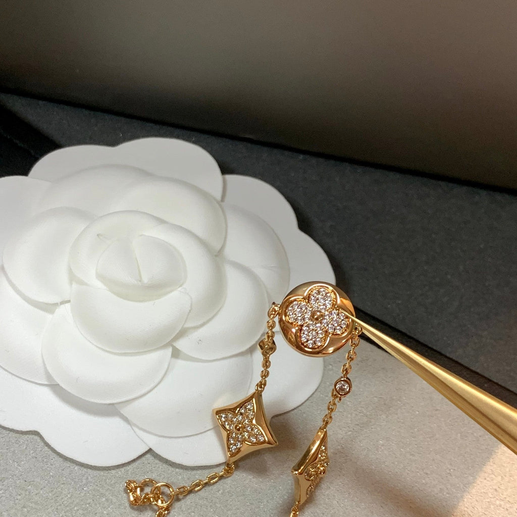 LOUIS VUITTON STAR AND SUN 4 MOTIFS GOLD DIAMONDS BRACELET