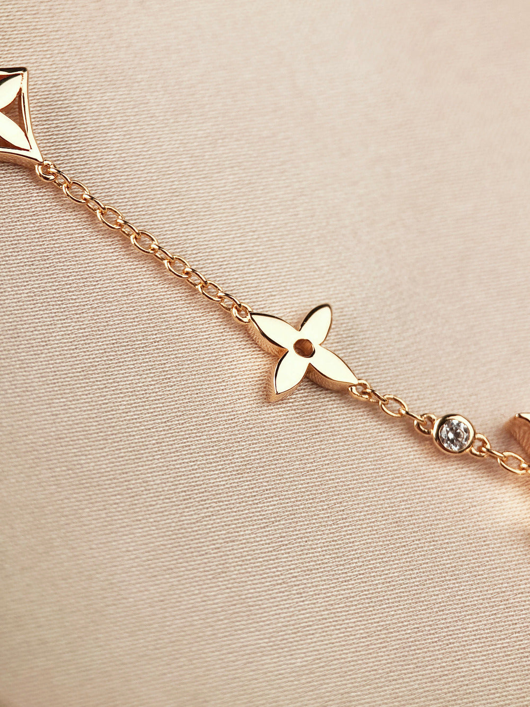 LOUIS VUITTON STAR AND SUN 7 MOTIFS GOLD BRACELET