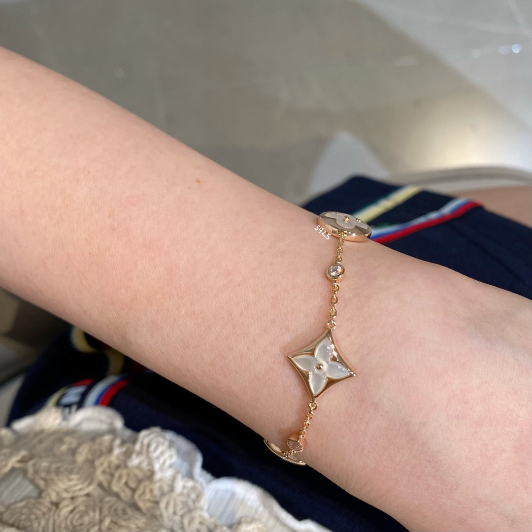 LOUIS VUITTON STAR AND SUN 4 MOTIF WHITE MOP PINK GOLD BRACELET