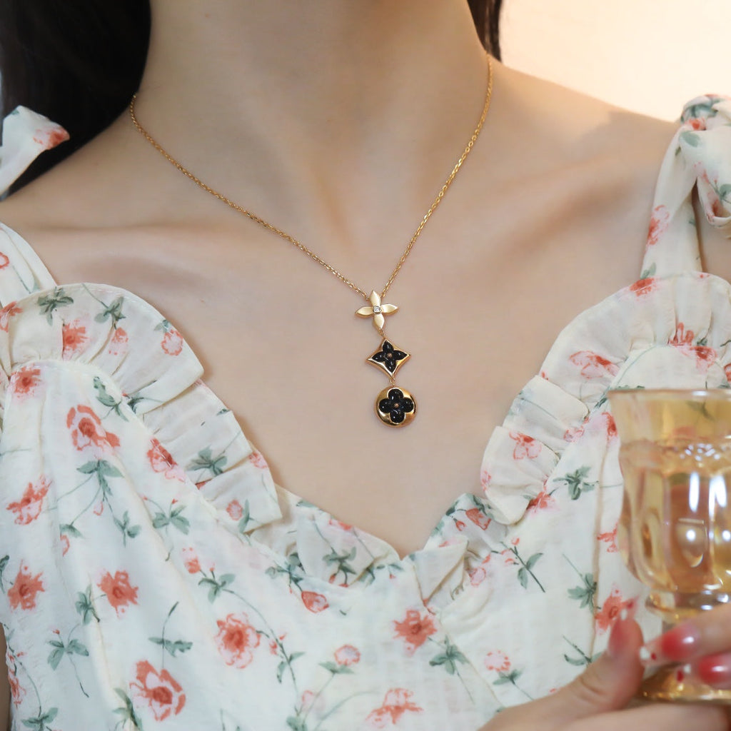 LOUIS VUITTON STAR AND SUN ONYX PINK GOLD NECKLACE